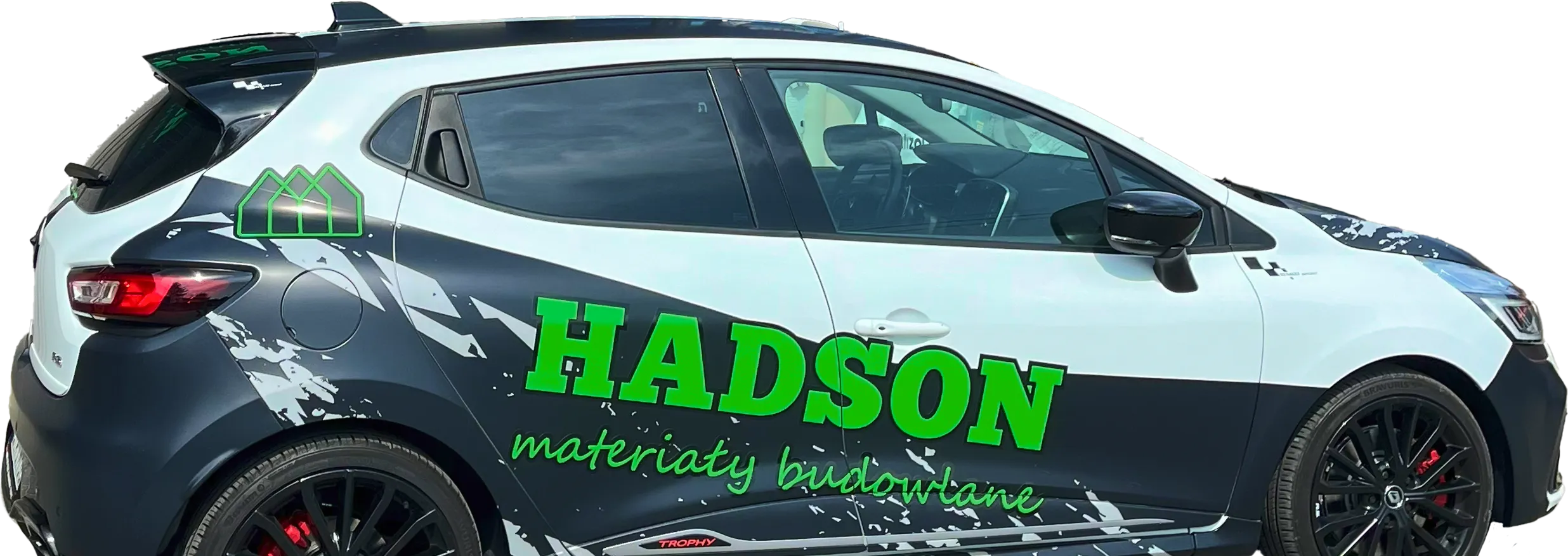 Samochód firmowy z zielono-czarnym logo Hadson i napisem materiały budowlane na bocznym panelu